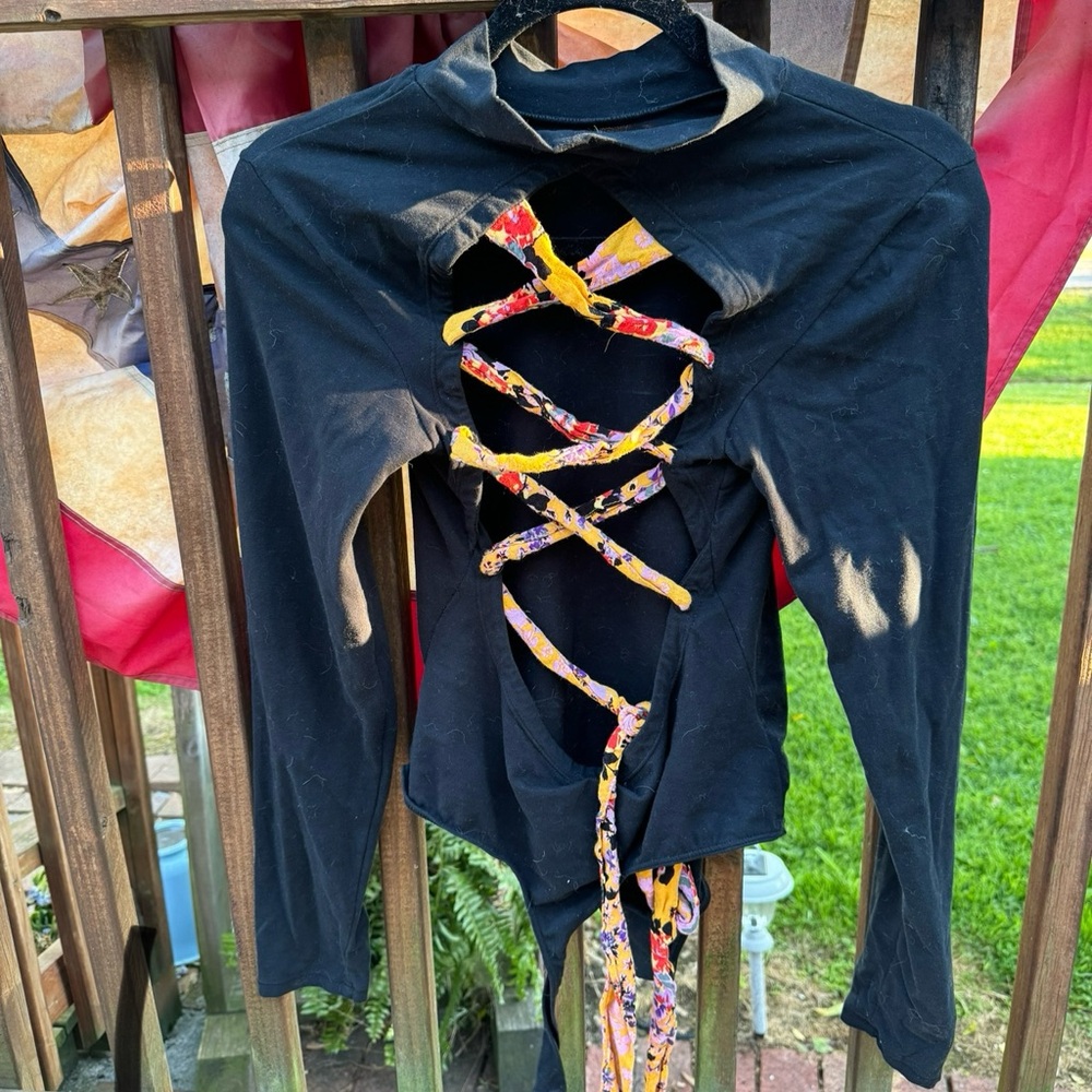 Black Long Sleeve Top with Floral Lace-Up Detail